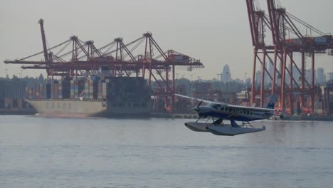 Impressive-Slow-Motion-Shot-of-a-Harbour-Air-Cessna-Caravan-Seaplane-Taking-Off-From-the-Harbor