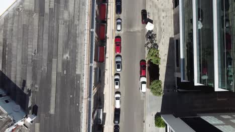 Top-view-drone-shot-on-the-main-street-of-santo-domingo,-churchill-avenue
