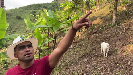 Local-young-Colombian-farmer-explaining-banana-farm-production-at-sunset-time