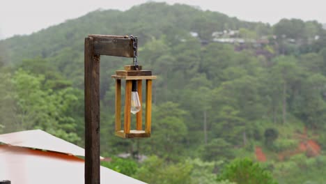 The-lamp-with-the-background-wooden-stairs-in-a-cafe-shop