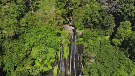 Tilt-down-shot-of-famous-Banyumala-waterfall-at-Bali-Indonesia,-aerial