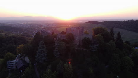 Silhouette-Badenweiler-Castle-Overlooking-The-Majestic-Sunset-In-Badenweiler,-Germany