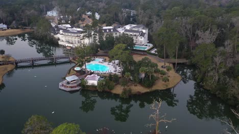 Summer-time-lake-side-village,-drone-footage-around-lake-real-estates