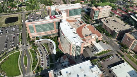 High-angle-aerial-descent-view-of-UCHealth-Anschutz-Medical-Campus,-Aurora