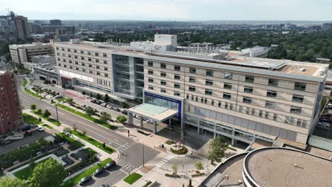 Aerial-pullback-riser-from-Saint-Joseph-Hospital-reveals-Denver-city-skyline