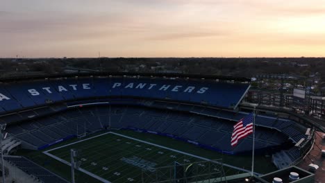 Cinematic-drone-shot-of-empty-Center-Parc-Stadium-with-the-view-of-Downtown-Atlanta-skyline-buildings