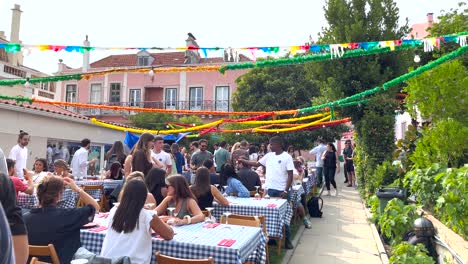 People-celebrating-Saint-Anthony-in-Lisbon,-a-famous-and-themed-celebration