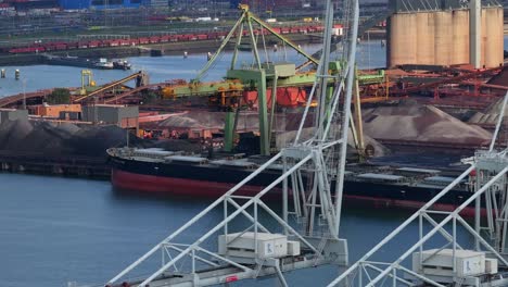 Large-crane-structures-in-operation-at-Maasvlakte-port,-Netherlands