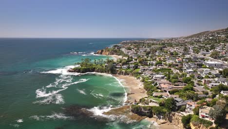 Laguna-Beach-California-aerial-drone-view-flying-high-over-the-Pacific-Ocean-and-Heisler-park