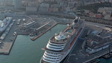 Docked-cruise-ship-at-terminal-of-Genova-port,-Liguria,-Italy
