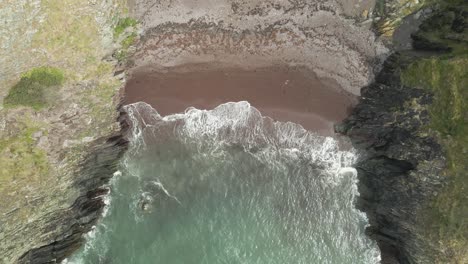 Bird's-Eye-View-Over-Ballycotton-Cliffs-And-Beach-In-County-Cork,-Ireland---drone-shot
