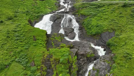 Slow-reveal-of-Sendefossen-River,-Waterfall,-Vikafjellet-Mountain,-Western-Norway