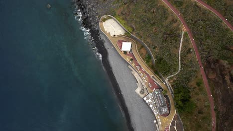 Aerial-Drone-View-Of-Praia-do-Garajau-Secluded-Rocky-Beach-In-Madeira-Near-Canico,-Portugal