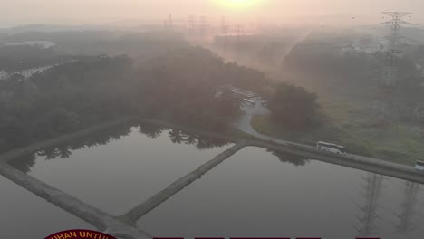 The-University-of-Technology-Malaysia-3D-Logo-with-drone-footage-background-during-the-morning-sunrise