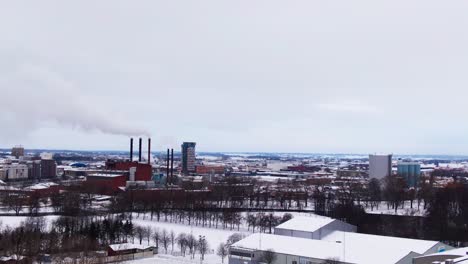 Aerial-tilt-down-drone-shot-view-revealing-city-Linköping-urban-area