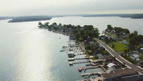 Drone-shot-of-the-beach-houses-and-boats-at-Sodus-point-New-York-vacation-spot-at-the-tip-of-land-on-the-banks-of-Lake-Ontario