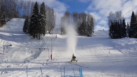 Powerful-snow-making-machine-works-to-make-fresh-snow-on-ski-slopes