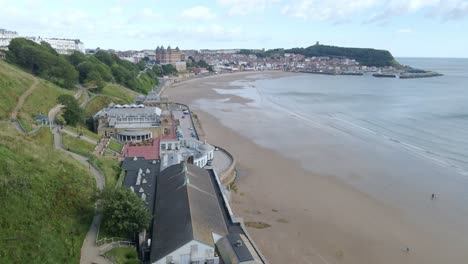 Aerial-bird's-eye-view-of-Scarborough's-Spar,-town,-beach,-harbor-and-castle
