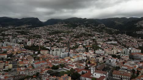 Aerial-View-Of-Canico-Town-On-Overcast-Day-In-Funchal,-Madeira-Island,-Portugal