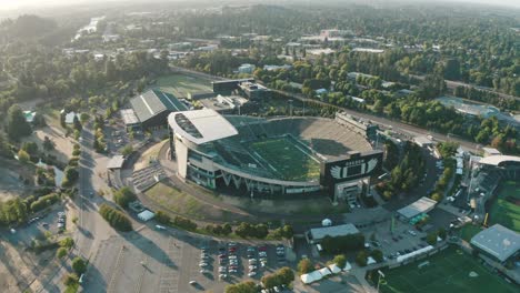 Drone-aerial-rotating-around-the-Autzen-Stadium-on-the-University-of-Oregon-campus-in-Eugene,-Oregon