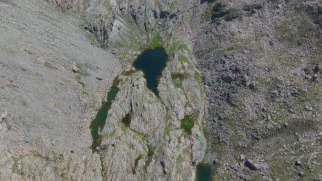 Mountain-lake-in-summer-season-at-Campagneda-area-in-Valmalenco-of-Valtellina-region-in-Italy