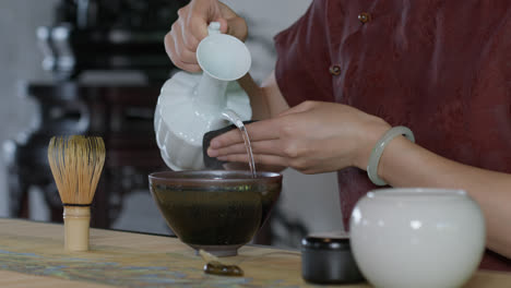 Person-preparing-the-traditional-Chinese-tea-ceremony