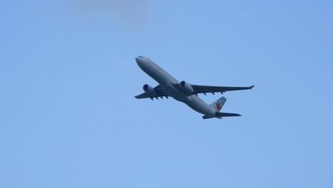 Air-Canada-Airbus-Ascending-Against-Cloudy-Sky-In-Daytime-In-Ontario,-Canada