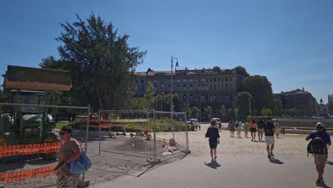 Bulldozer-working-in-cairoli-square-in-front-of-the-fountain