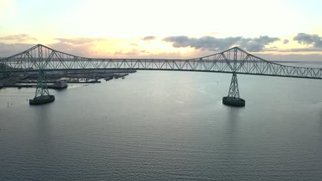 The-Astoria-Megler-Bridge-In-Astoria,-Oregon,-USA,-drone-at-sunset