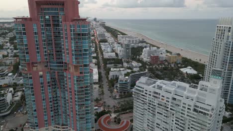 aerial-view-of-skyline-in-south-beach-with-Portofino-skyscraper-red-tower-at-sunset