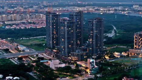 In-this-editorial-illustrative-view-from-the-Saigon-Skydeck-atop-the-Bitexco-Financial-Tower,-Ho-Chi-Minh-City-is-bejewelled-with-an-imposing-skyline,-beautiful-scenery-and-city-lights