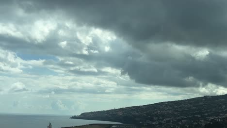 A-real-take-off-from-Funchal-airport,-Madeira-Island,-as-seen-by-the-pilots,-in-a-winter-rainy-day