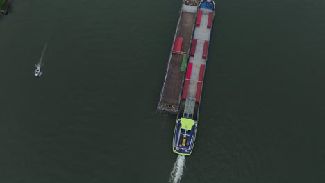 Birdseye-view-of-the-H2-Barge-sailing-past-Dordrecht-on-the-Oude-Maas-river