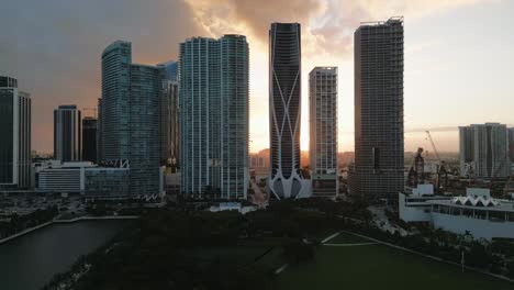 Aerial-Establishing-Shot-of-a-Backlit-Modern-Apartment-Skyscrapers-in-Downtown-Miami,-Florida