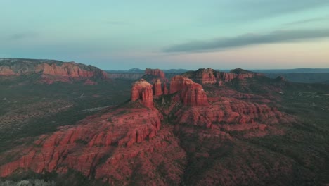Scenic-View-Of-Cathedral-Rock-Sandstone-Butte-Near-Sedona,-Arizona-At-Sunset---aerial-shot
