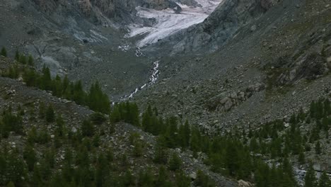 Epic-aerial-view-of-mountain-landscape-with-Alpe-ventina-glacier,-cinematic