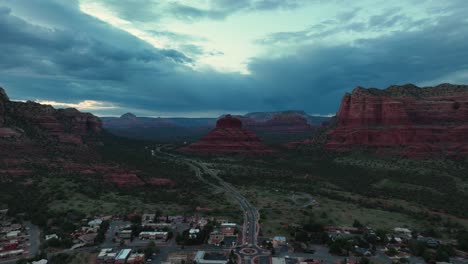 Panoramic-Aerial-View-Of-Traffic-Over-Roundabout-In-Red-Rocks,-Sedona,-Arizona-USA
