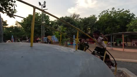 Little-children-are-climbing-on-amusement-park-rides-on-holiday