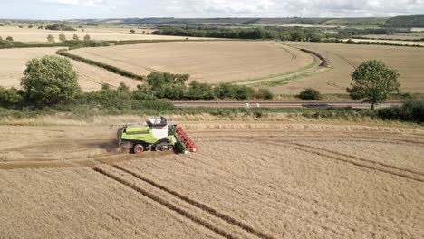 Aerial-footage-of-a-combine-harvester-harvesting-a-wheat-crop