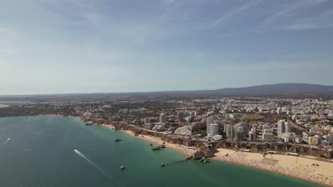 Ciudad-Turística-Portuguesa-De-Portimao-Vista-Aérea-En-Un-Día-Soleado-Sur-De-Portugal-Algarve