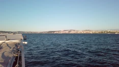 Evening,-cinematic-slow-mo,-a-stunning-view-of-Istanbul's-Asian-continent-from-a-ferry-on-the-Bosphorus