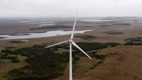Wide-drone-shot-of-a-Scottish-wind-turbine-generating-renewable-energy