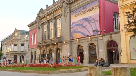 Theatro-Circo-in-Braga,-Portugal-during-the-evening,-lots-of-people-attending-different-Events