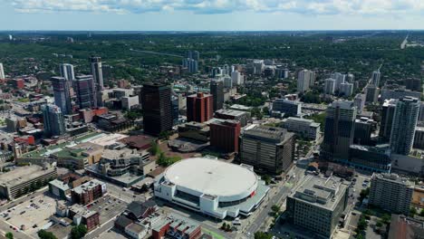 Aerial-drone-pan-out-downtown-Hamilton-arena-Bright-summer-day-First-Ontario-Centre-to-enjoy-sports-and-entertainment-arena-at-the-corner-of-Bay-Street-North-and-York-Boulevard-built-in-1985-holds-19k