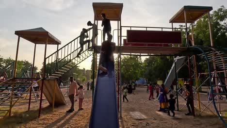 A-lot-of-kids-are-sliding-in-the-amusement-park-during-the-holidays-and-the-kids-are-having-fun