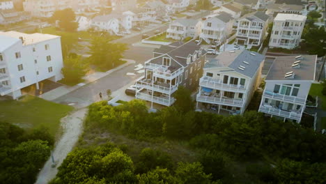 Aerial-view-toward-a-luxury-villa,-sunny-morning-in-the-Jersey-shore,-NJ,-USA