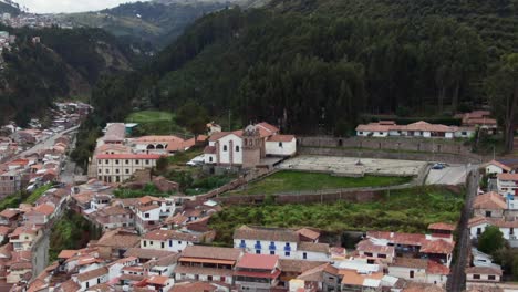 Aerial-View-Of-San-Cristobal-Church-On-A-Hill-In-Cusco,-Peru