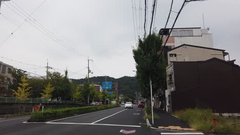Kyoto-City-Street-Car-Traffic-near-Ginkaku-Ji-Area-Japan,-Driving-in-Summer