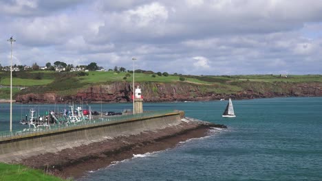 Waterford-Dunmore-East-yacht-returning-to-harbour-after-racing-in-the-Waterford-estuary-autumn-morning