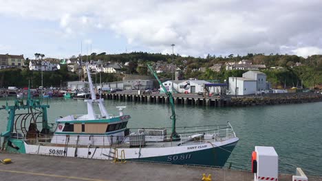 Dunmore-East-Waterford-fishing-boat-preparing-to-return-to-sea-September-afternoon